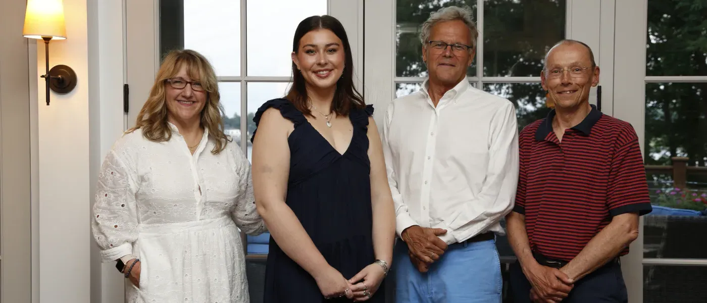 Abbie Anderson poses with Justine Bassett, Michael Sheldon, and Ford Reiche